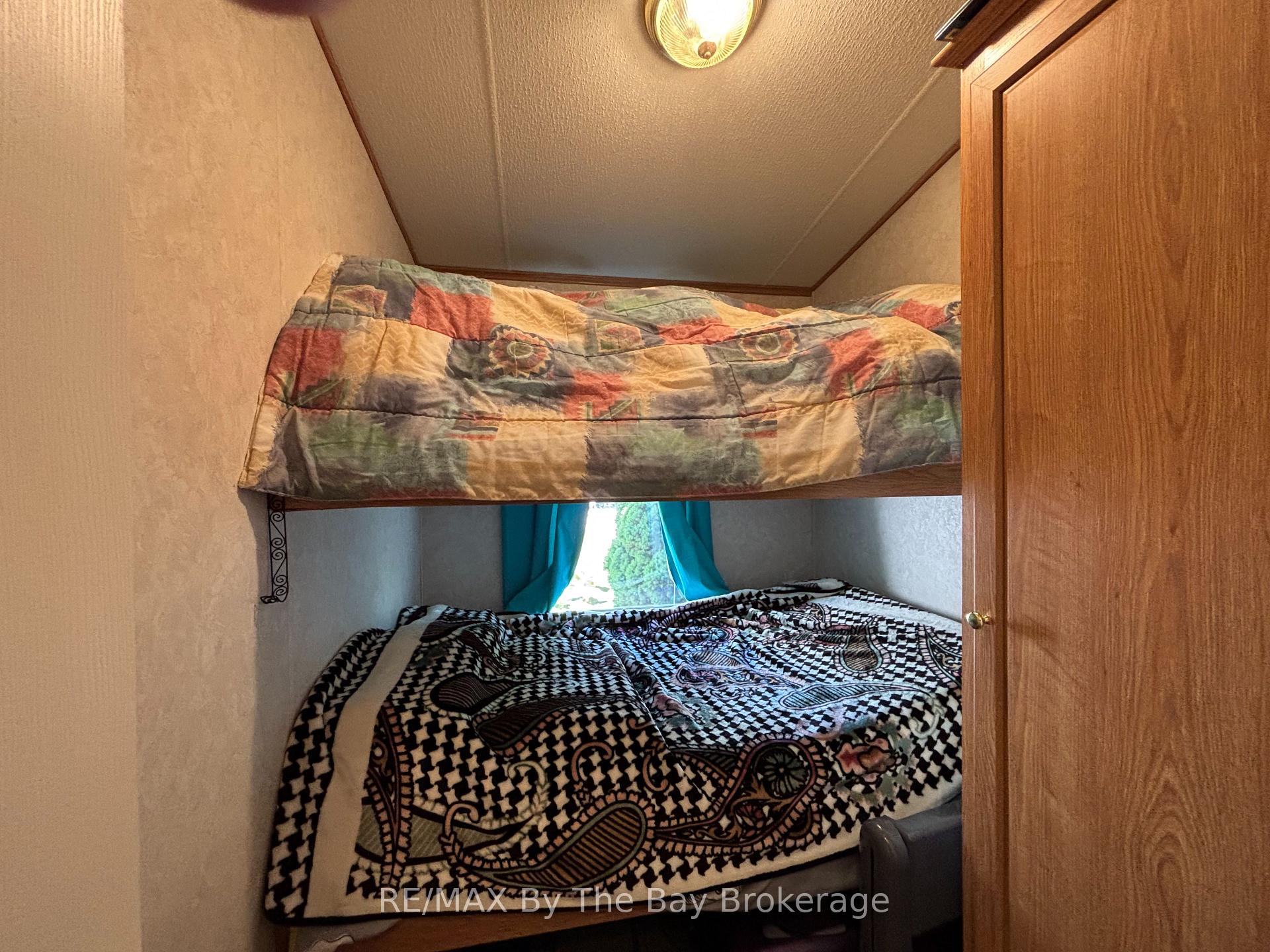 Photo 23 of Unit 92, 85 Theme Park Drive, Wasaga Beach — HOMEH