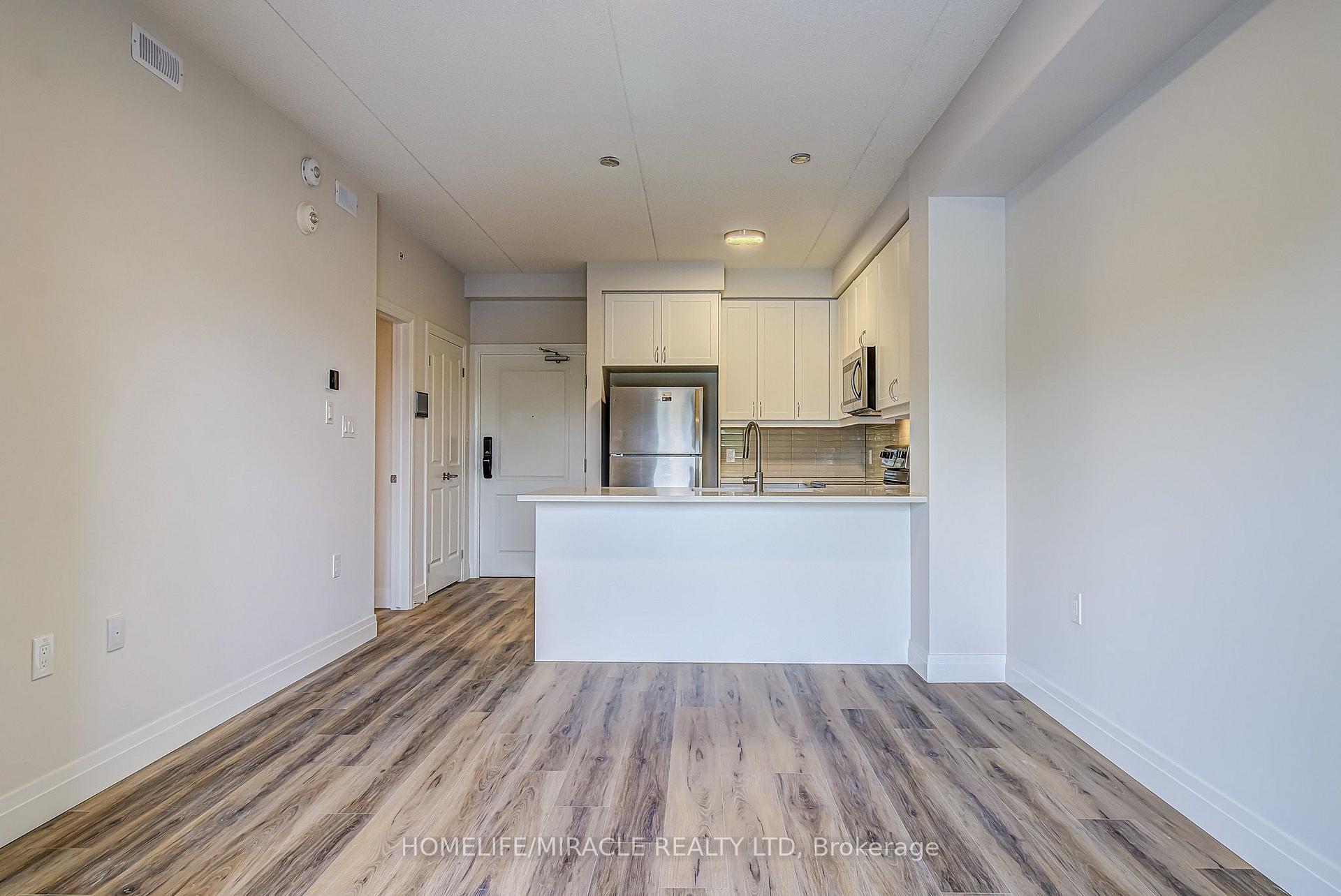 Photo 1 of Unit 303, 6415 Regional Road, Milton, Coates — HOMEH