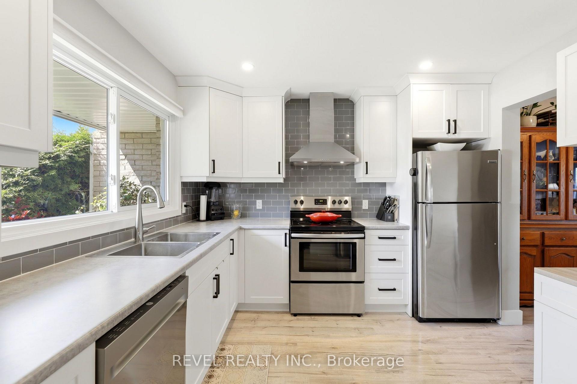 Photo 7 of Unit 2, 669 Osgoode Drive, London, South Y — HOMEH