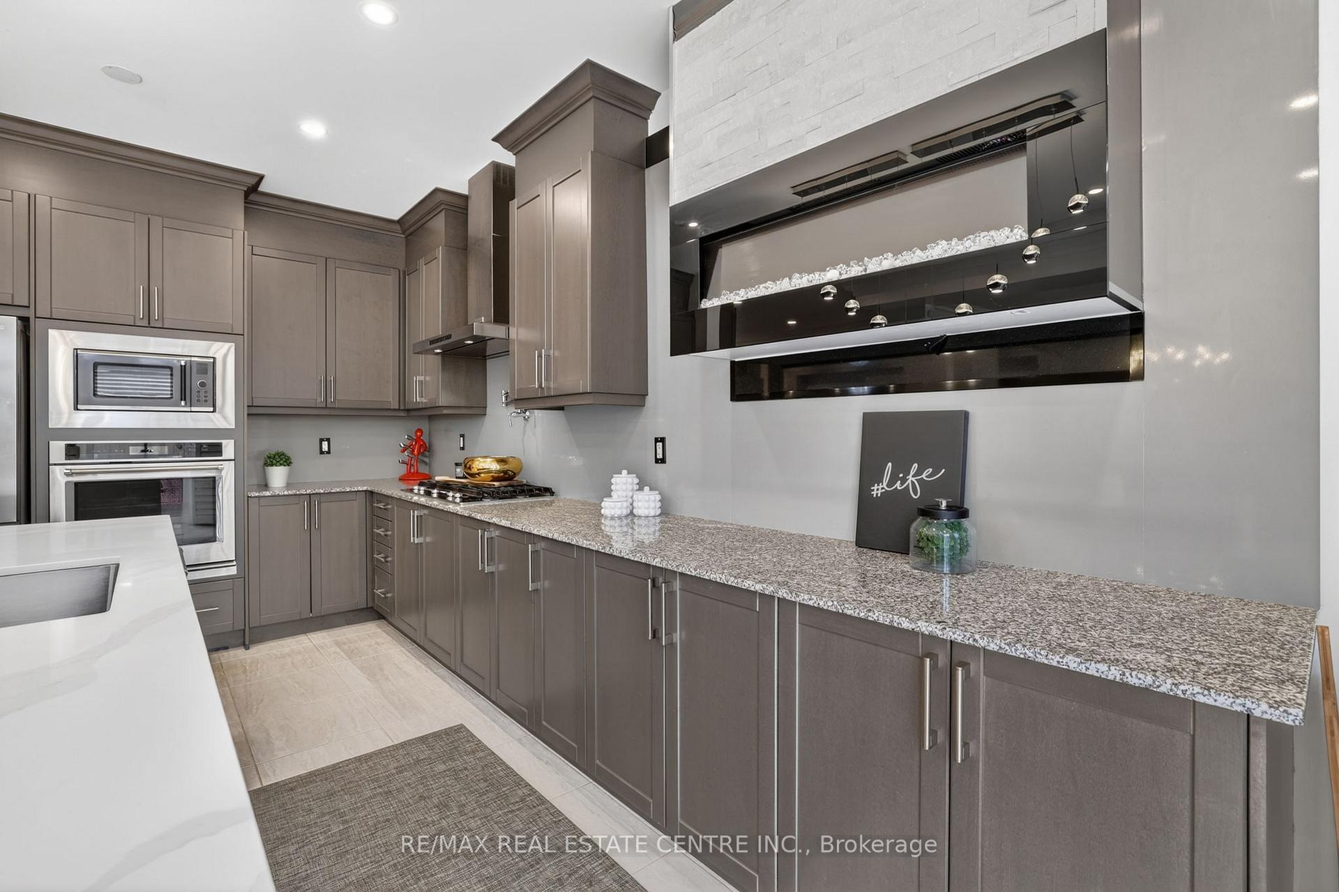 Photo 12 of 27 Drew Brown Boulevard, Orangeville — HOMEH