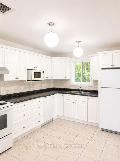Photo 7 of Unit 201, 208 Centre Street S, Oshawa, Central — HOMEH