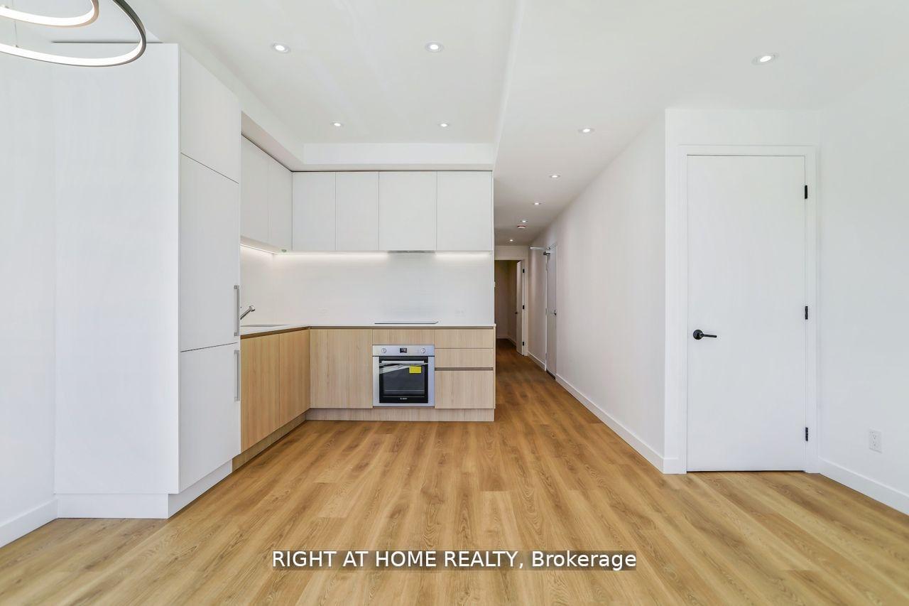 Photo 2 of Unit 201, 1086 St Clair Avenue W, Toronto, Oakwood Village — HOMEH