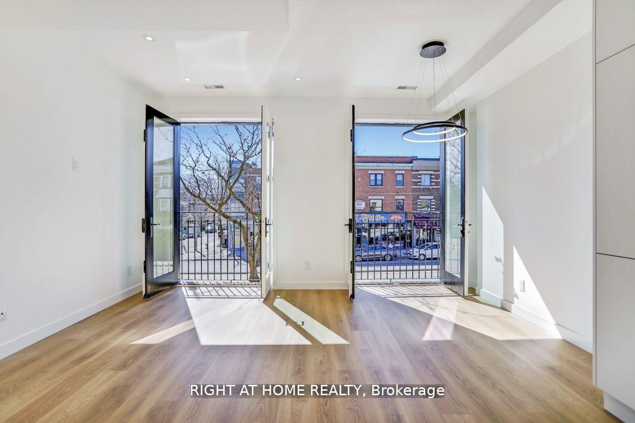 Photo 3 of Unit 201, 1086 St Clair Avenue W, Toronto, Oakwood Village — HOMEH