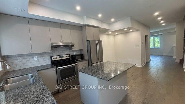 Photo 3 of 35 Frederick Tisdale Drive, North York, Downsview-Roding-CFB — HOMEH