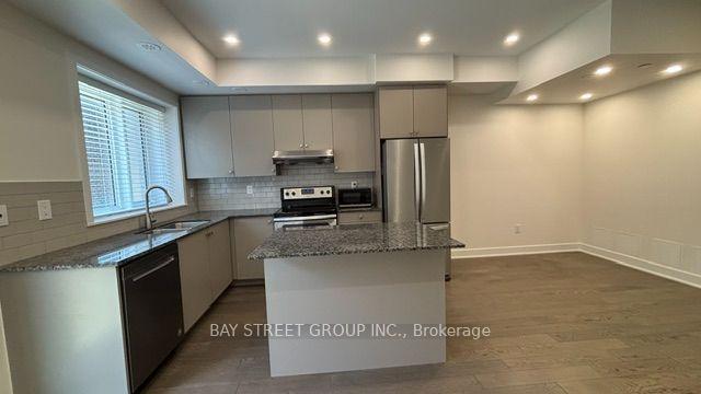 Photo 4 of 35 Frederick Tisdale Drive, North York, Downsview-Roding-CFB — HOMEH