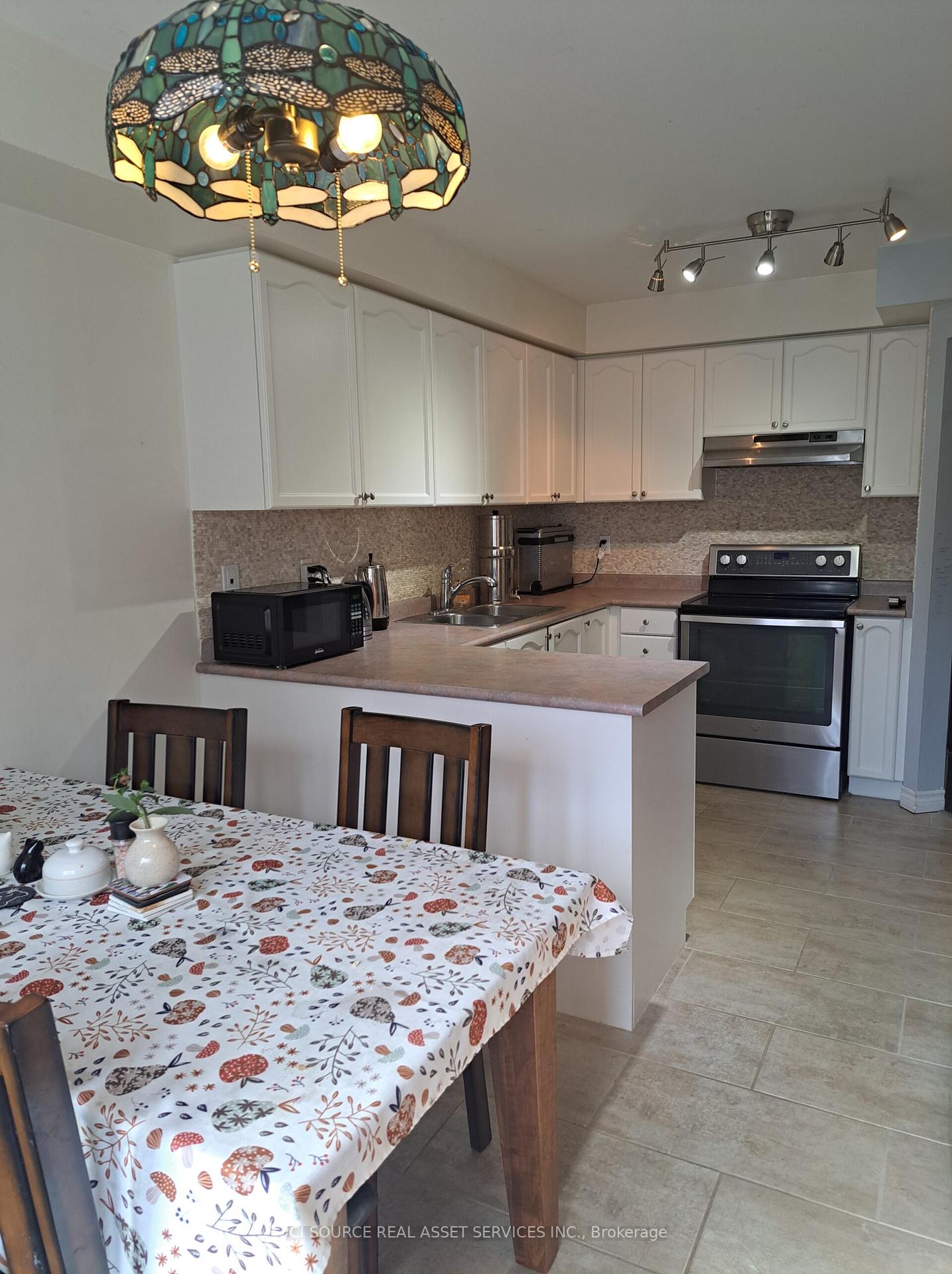 Photo 2 of Unit 4, 120 Railroad Street, Brampton, Downtown Brampton — HOMEH