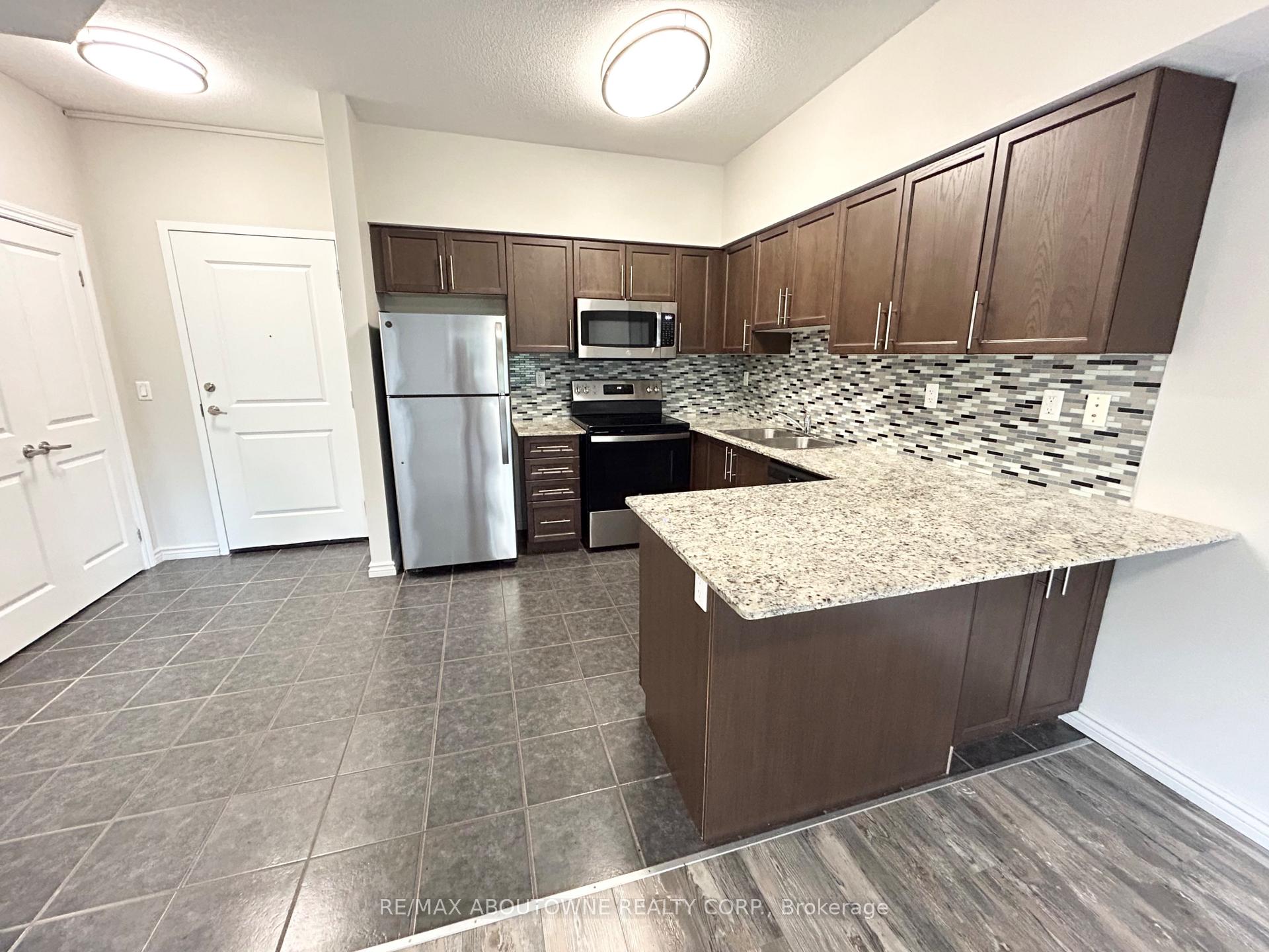 Photo 2 of Unit 203, 5 Rittenhouse Road, Kitchener, Country Hills West — HOMEH
