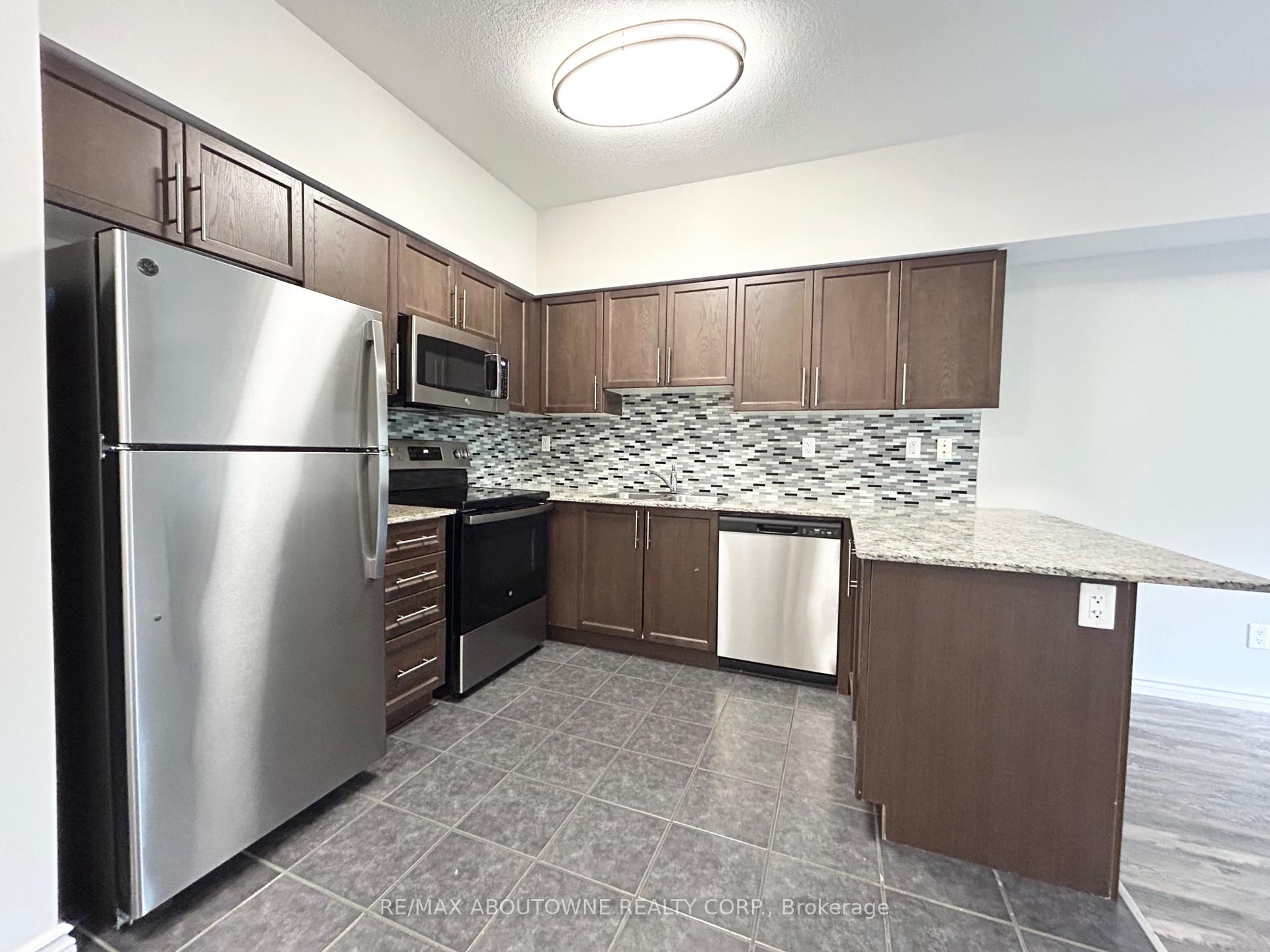Photo 3 of Unit 203, 5 Rittenhouse Road, Kitchener, Country Hills West — HOMEH