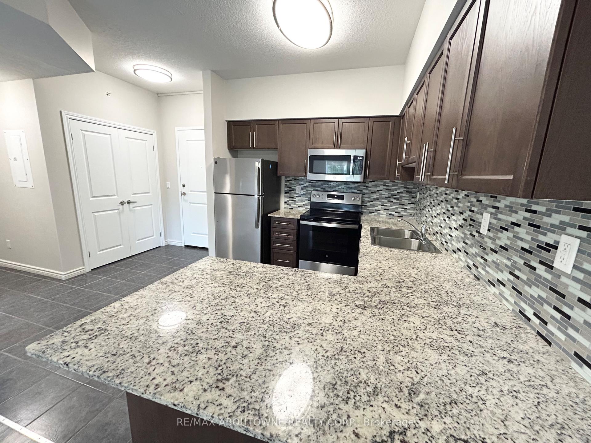Photo 5 of Unit 203, 5 Rittenhouse Road, Kitchener, Country Hills West — HOMEH