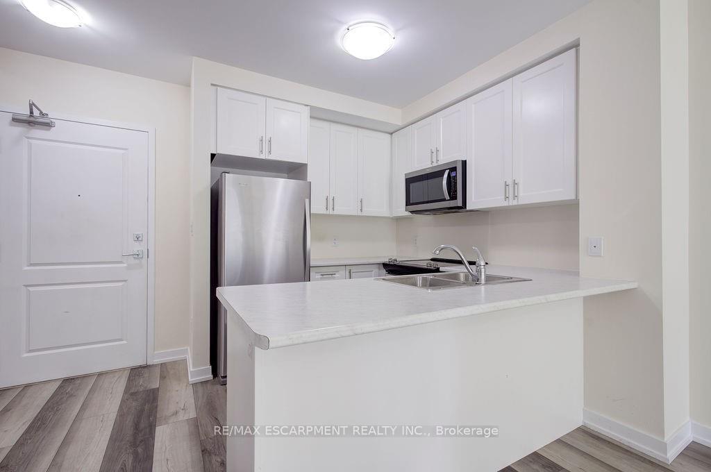 Photo 2 of Unit 110, 450 Dundas Street E, Hamilton, Waterdown — HOMEH