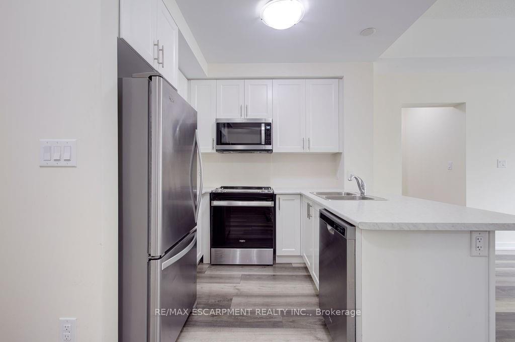 Photo 3 of Unit 110, 450 Dundas Street E, Hamilton, Waterdown — HOMEH