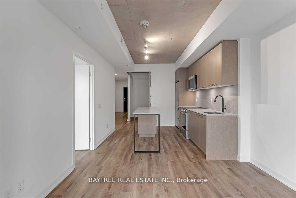 Photo 4 of Unit 201, 1808 St Clair Avenue W, Toronto, Weston-Pellam Park — HOMEH
