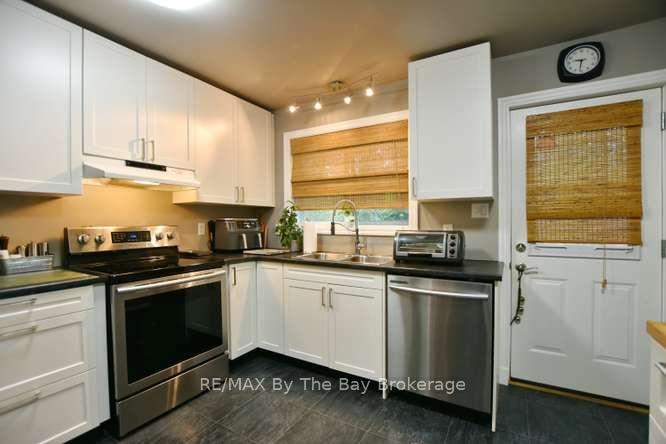 Photo 12 of 60 53rd Street S, Wasaga Beach — HOMEH