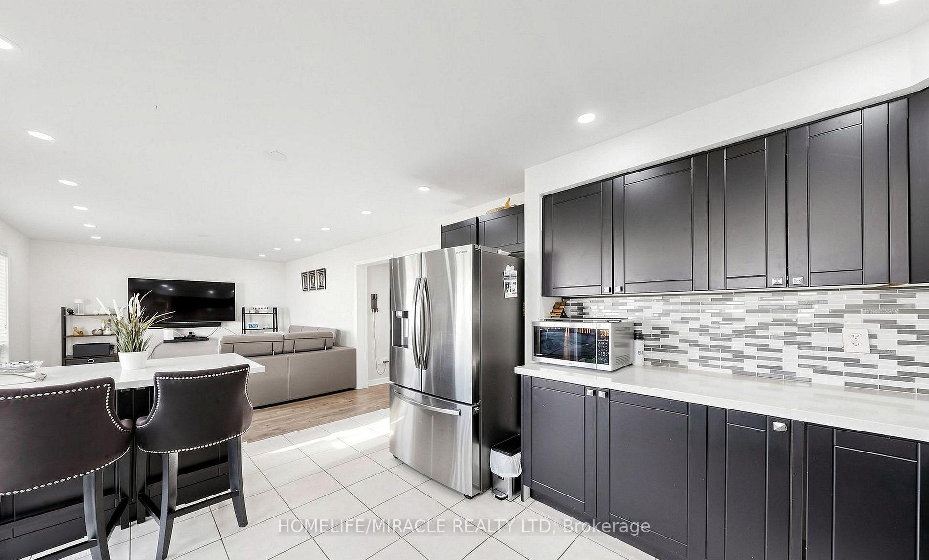 Photo 11 of 361 Brisdale Drive N, Brampton, Fletcher's Meadow — HOMEH