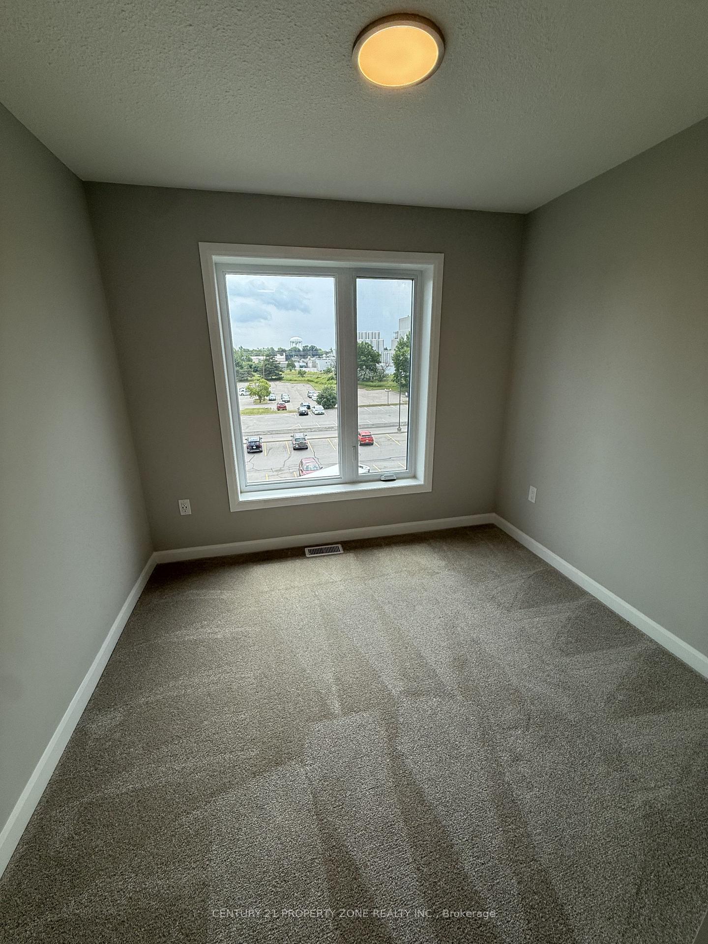 Photo 6 of Unit 105, 708 Woolwich Street, Guelph, Riverside Park — HOMEH