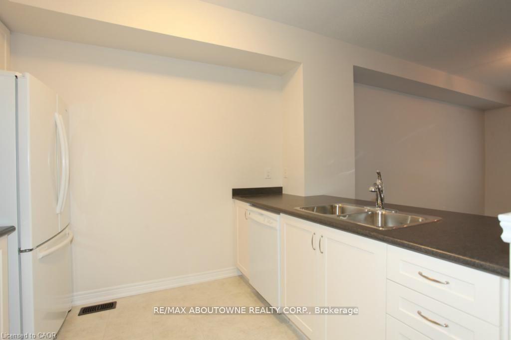 Photo 6 of Unit 104, 1401 Plains Road E, Burlington, Freeman — HOMEH