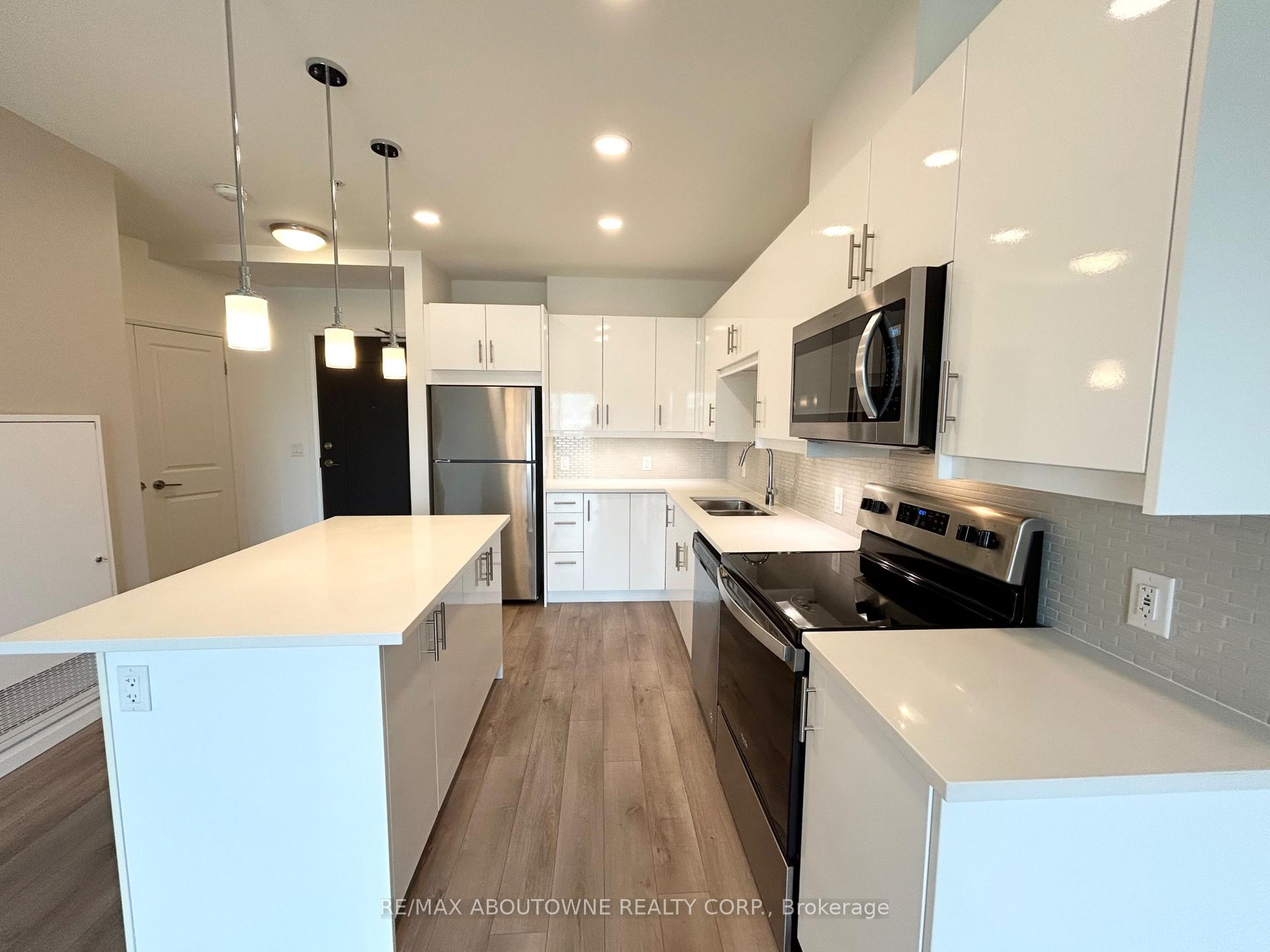Photo 4 of Unit 407, 144 Watson Road N, Guelph, Grange Road — HOMEH
