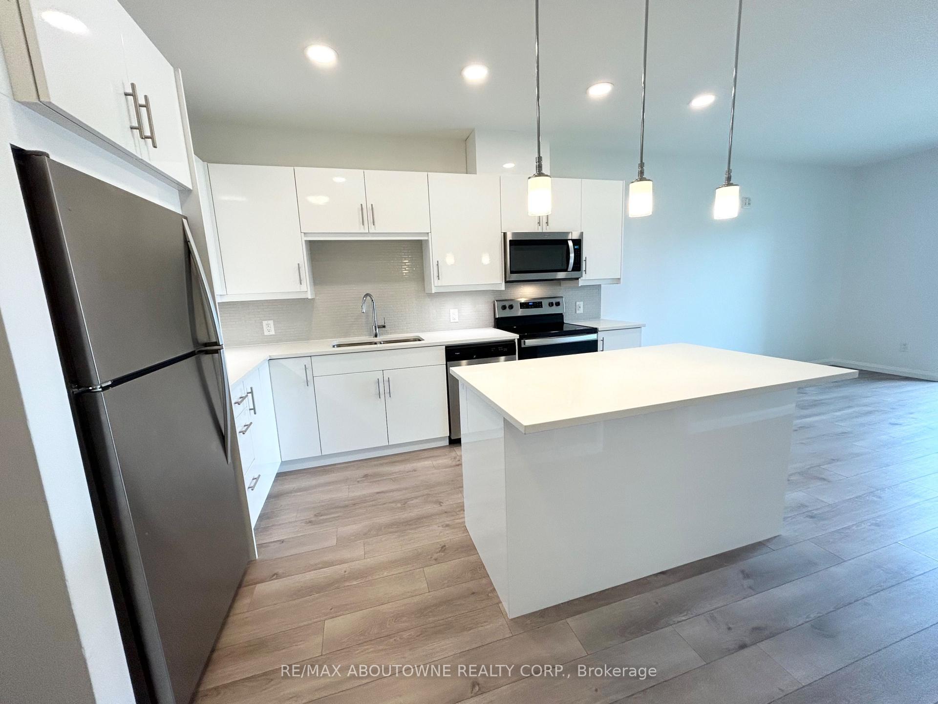 Photo 5 of Unit 407, 144 Watson Road N, Guelph, Grange Road — HOMEH