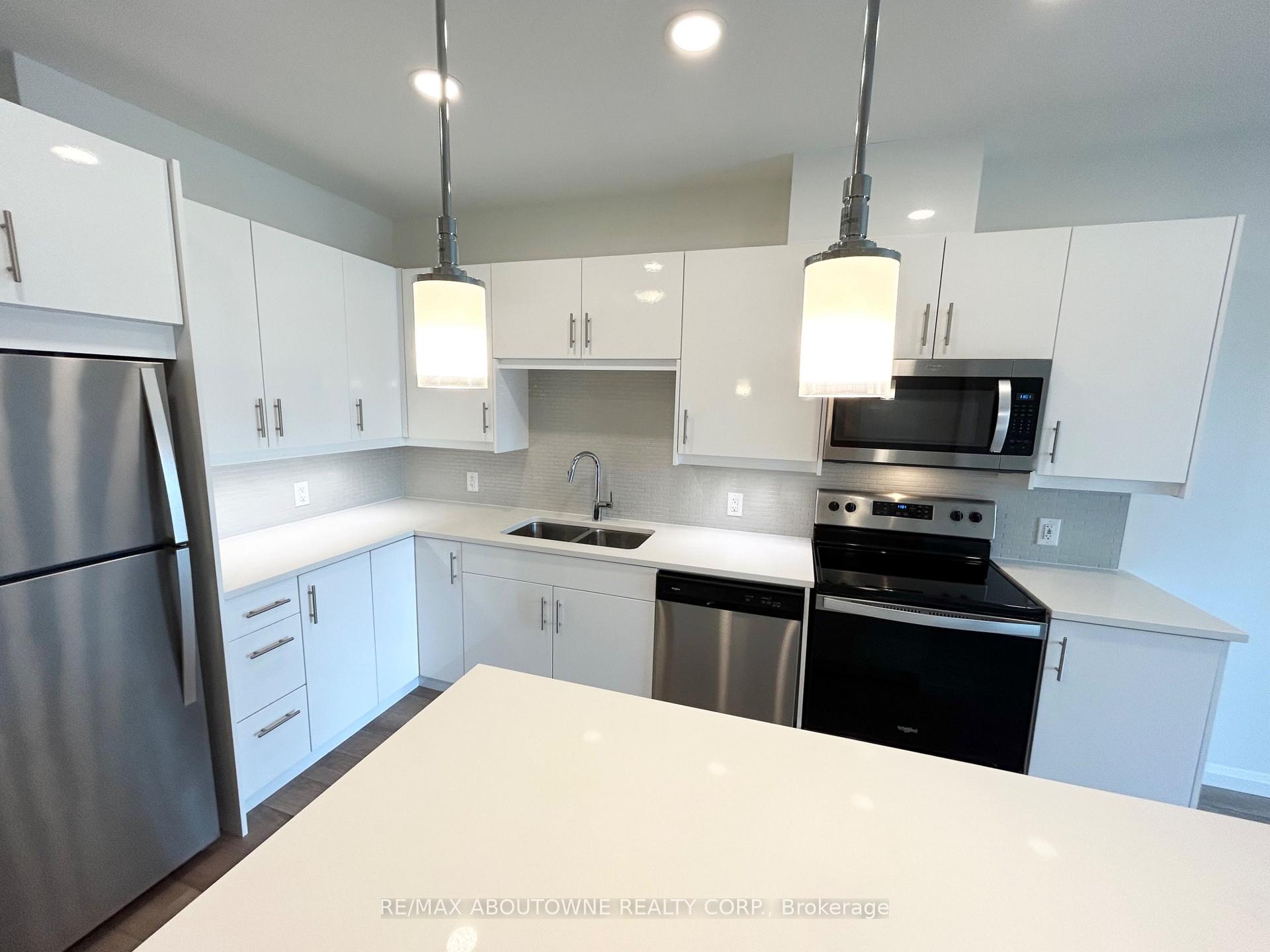 Photo 7 of Unit 407, 144 Watson Road N, Guelph, Grange Road — HOMEH