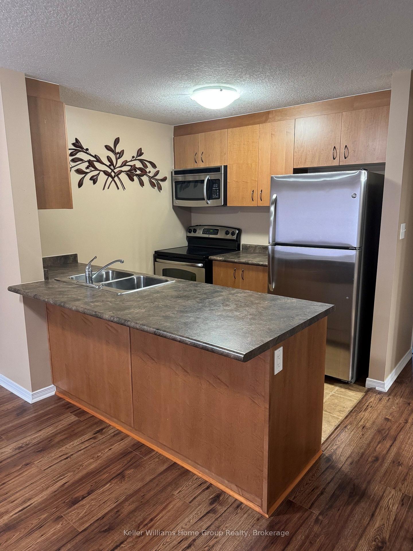 Photo 7 of Unit 26, 35 Mountford Drive, Guelph, Grange Road — HOMEH