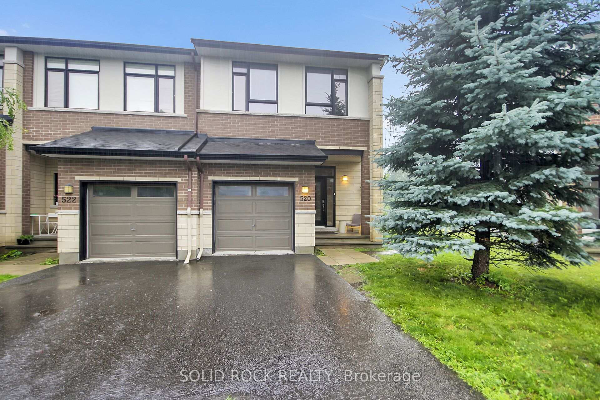 Front of 520 Grand Tully Way