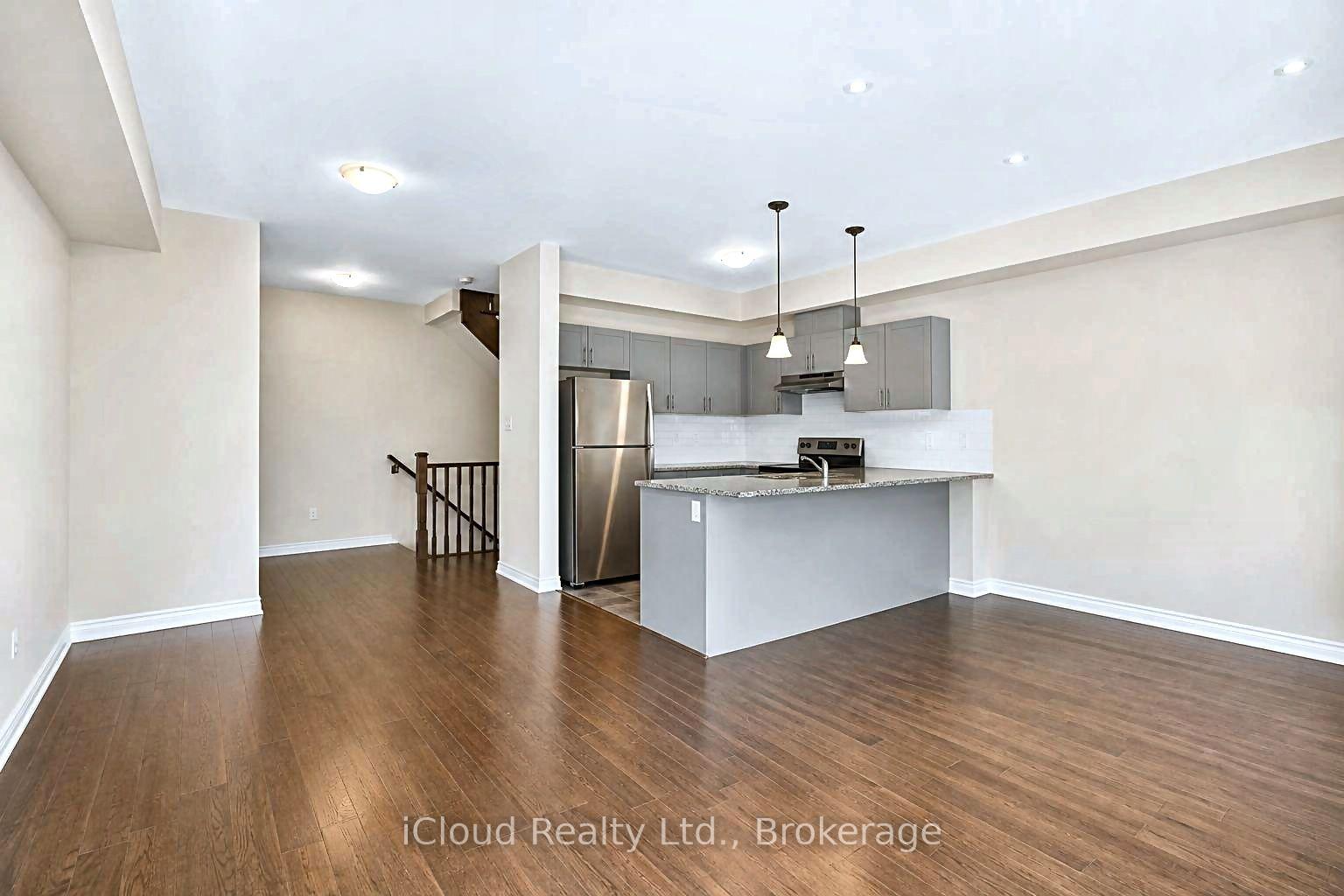 Photo 4 of Unit 15, 88 Decorso Drive, Guelph, Kortright East — HOMEH