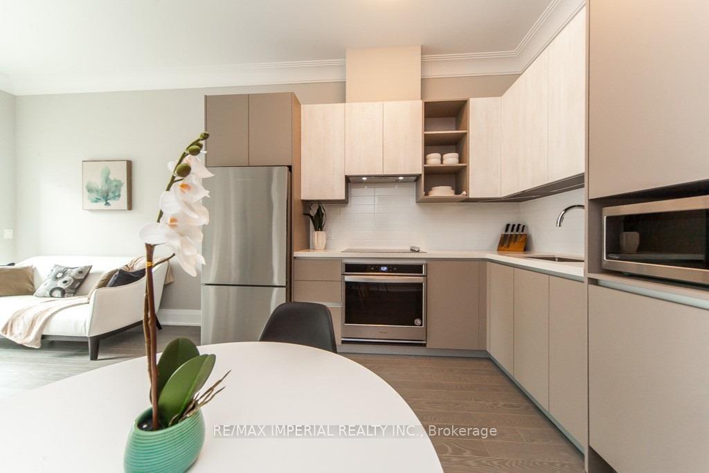Photo 10 of Unit 107, 398 Highway 7 E, Richmond Hill, Doncrest — HOMEH