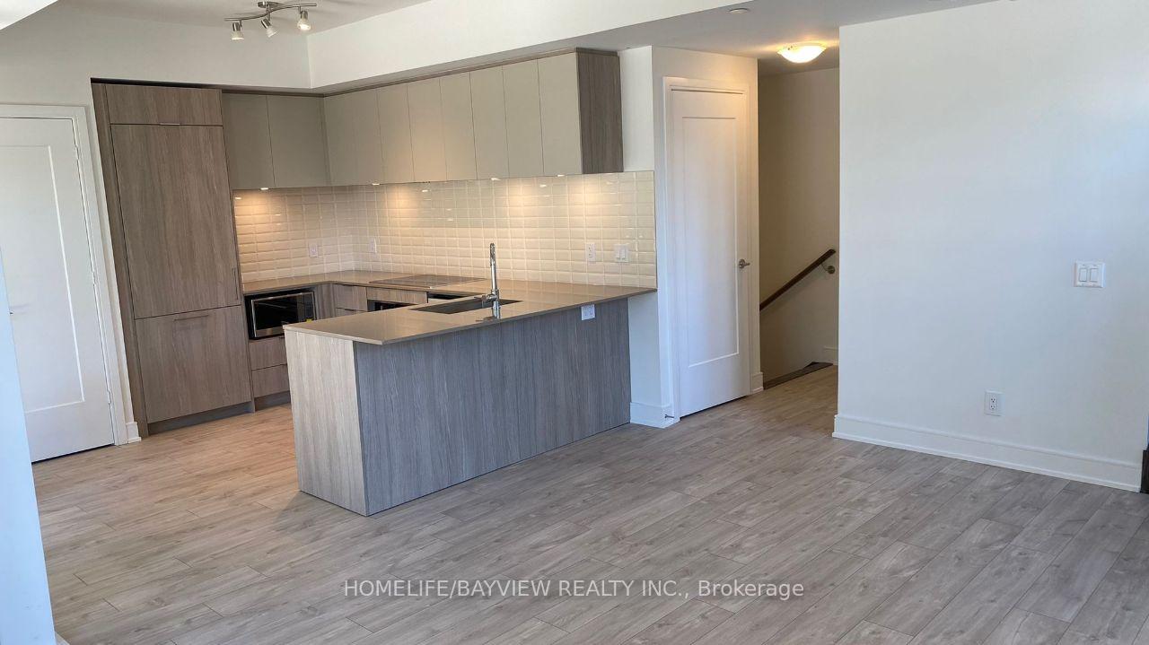 Photo 3 of Unit TH 101, 70 Annie Craig Drive, Etobicoke, Mimico — HOMEH