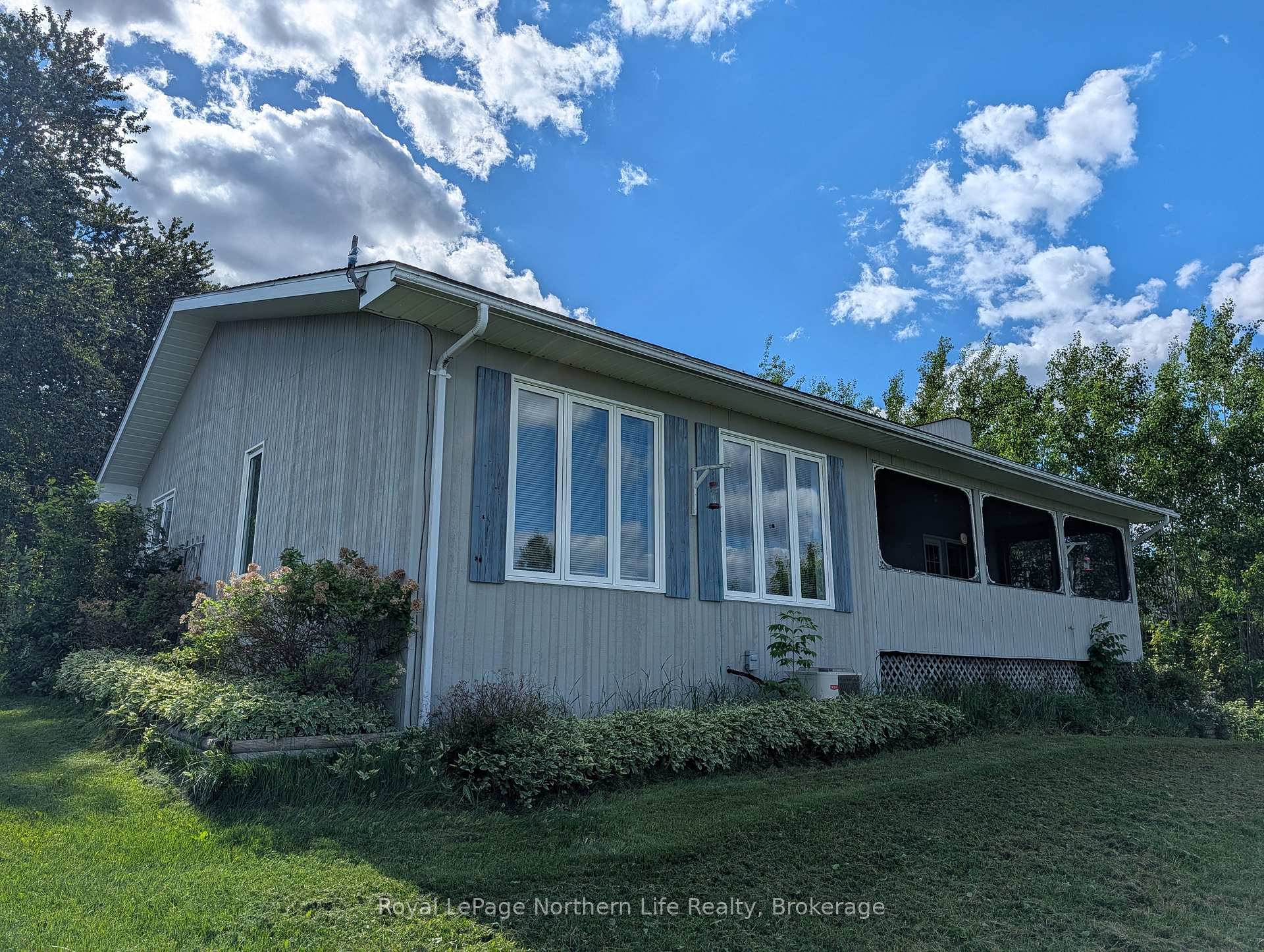 Photo 3 of 501182 Berry Road, Timiskaming, TIM - Outside - Rural — HOMEH