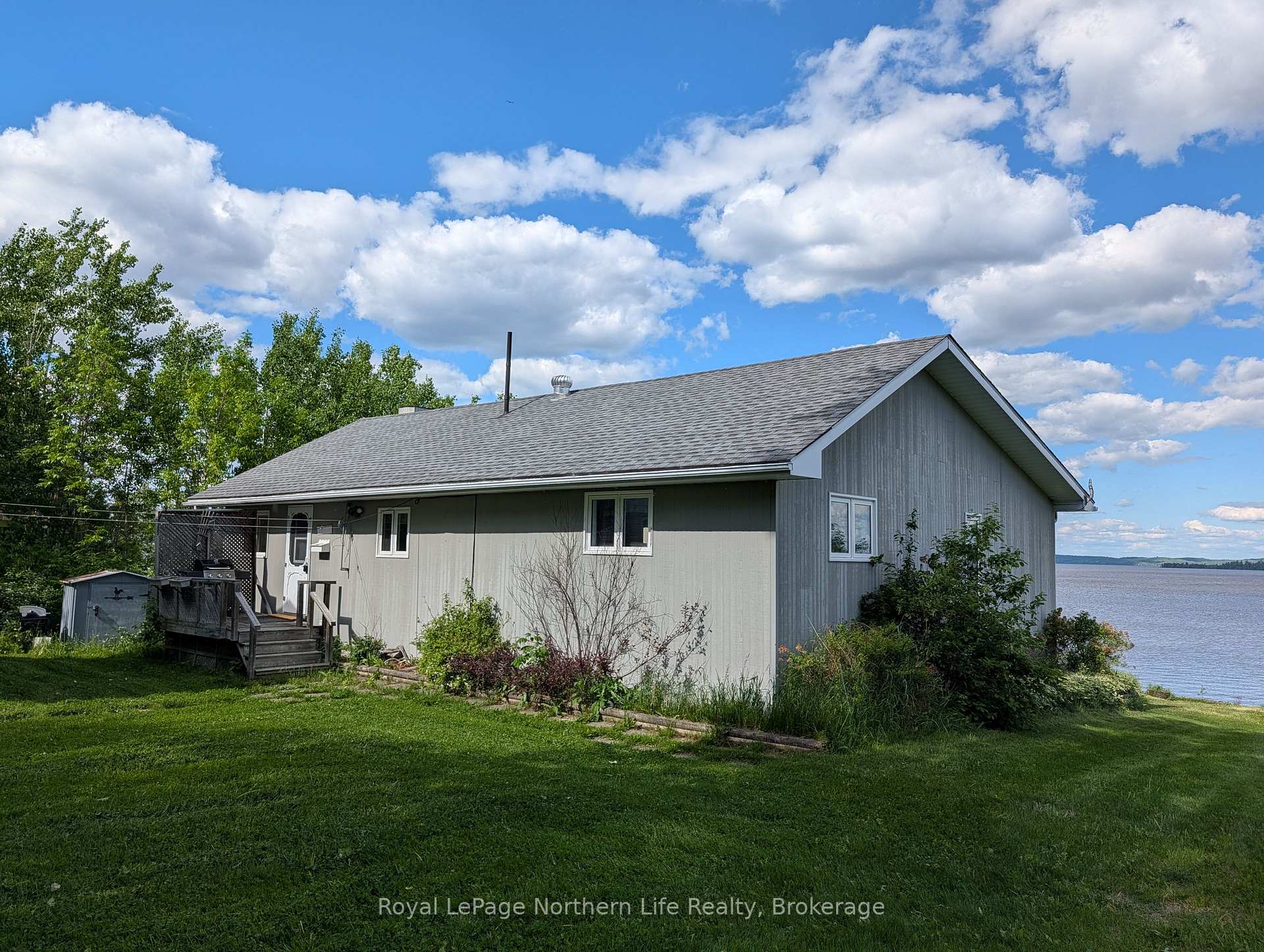 Photo 4 of 501182 Berry Road, Timiskaming, TIM - Outside - Rural — HOMEH