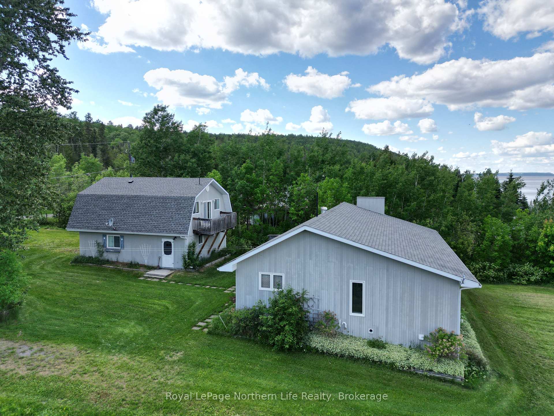 Photo 5 of 501182 Berry Road, Timiskaming, TIM - Outside - Rural — HOMEH
