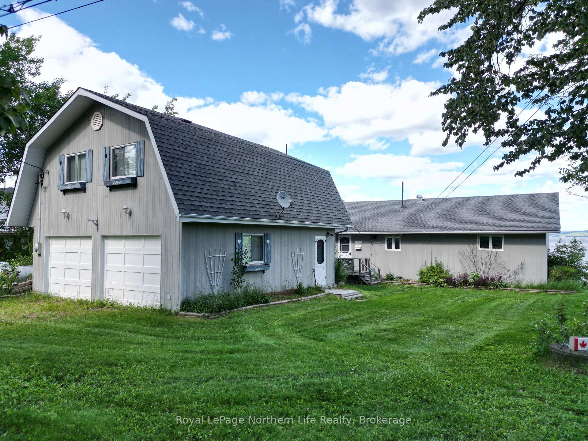 Photo 6 of 501182 Berry Road, Timiskaming, TIM - Outside - Rural — HOMEH