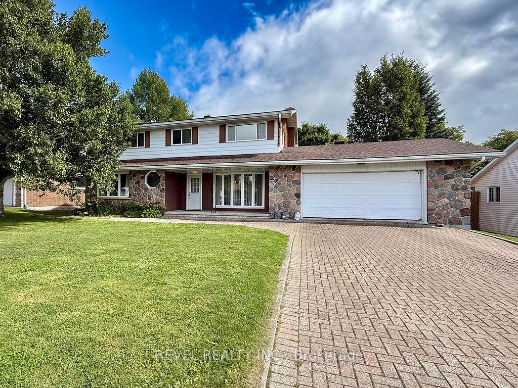 Photo 2 of 624 Cedar Street N, Timmins, TNE - North — HOMEH