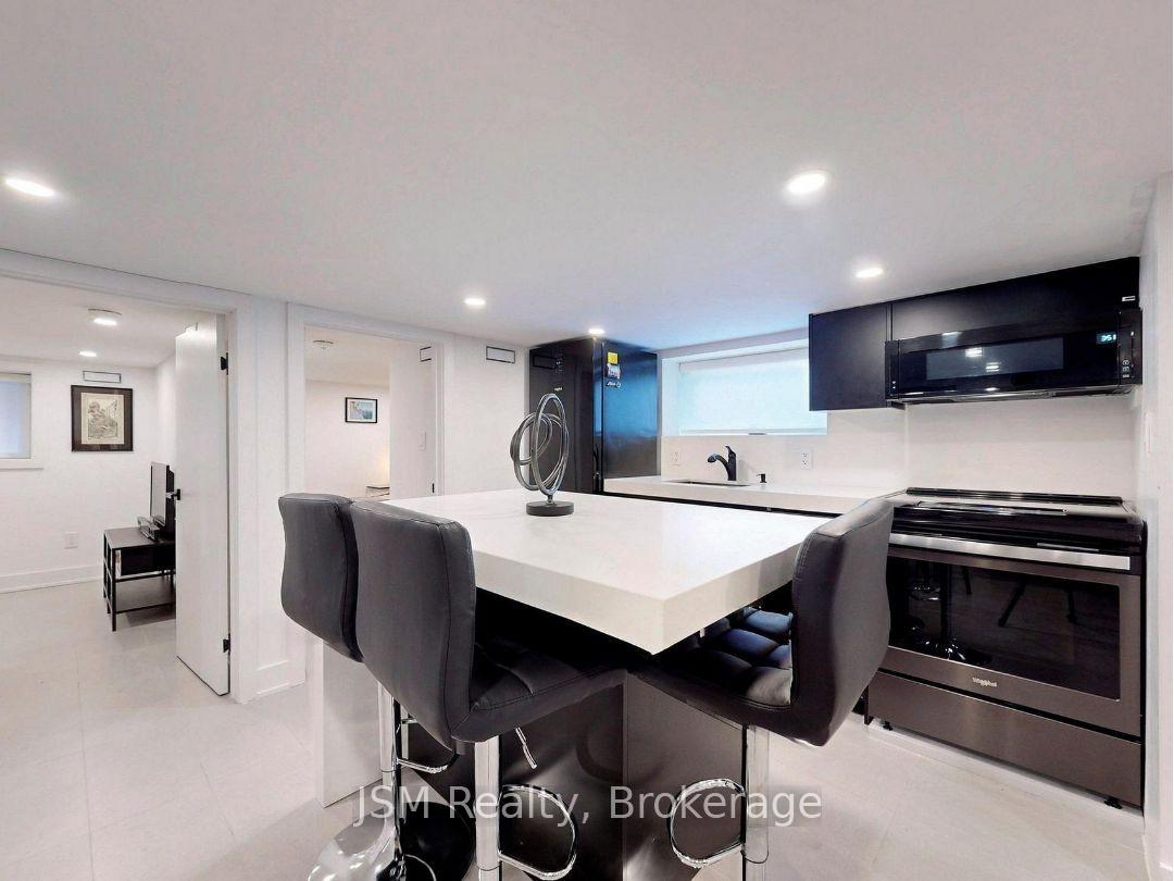 Photo 6 of Unit Lower, 26 Rogers Road S, Toronto, Oakwood Village — HOMEH