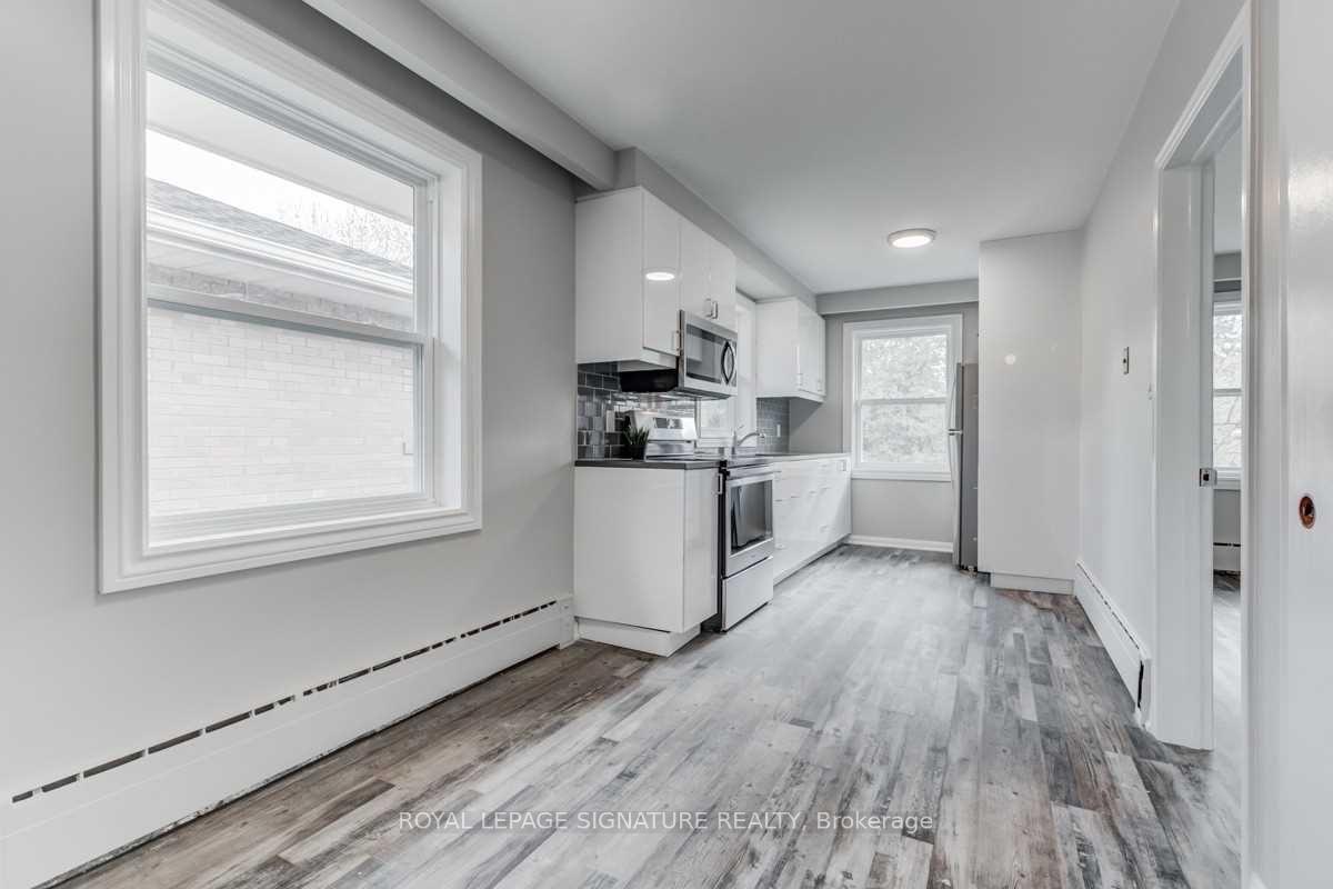 Photo 3 of Unit 1, 31 Elma Street, Etobicoke, Mimico — HOMEH