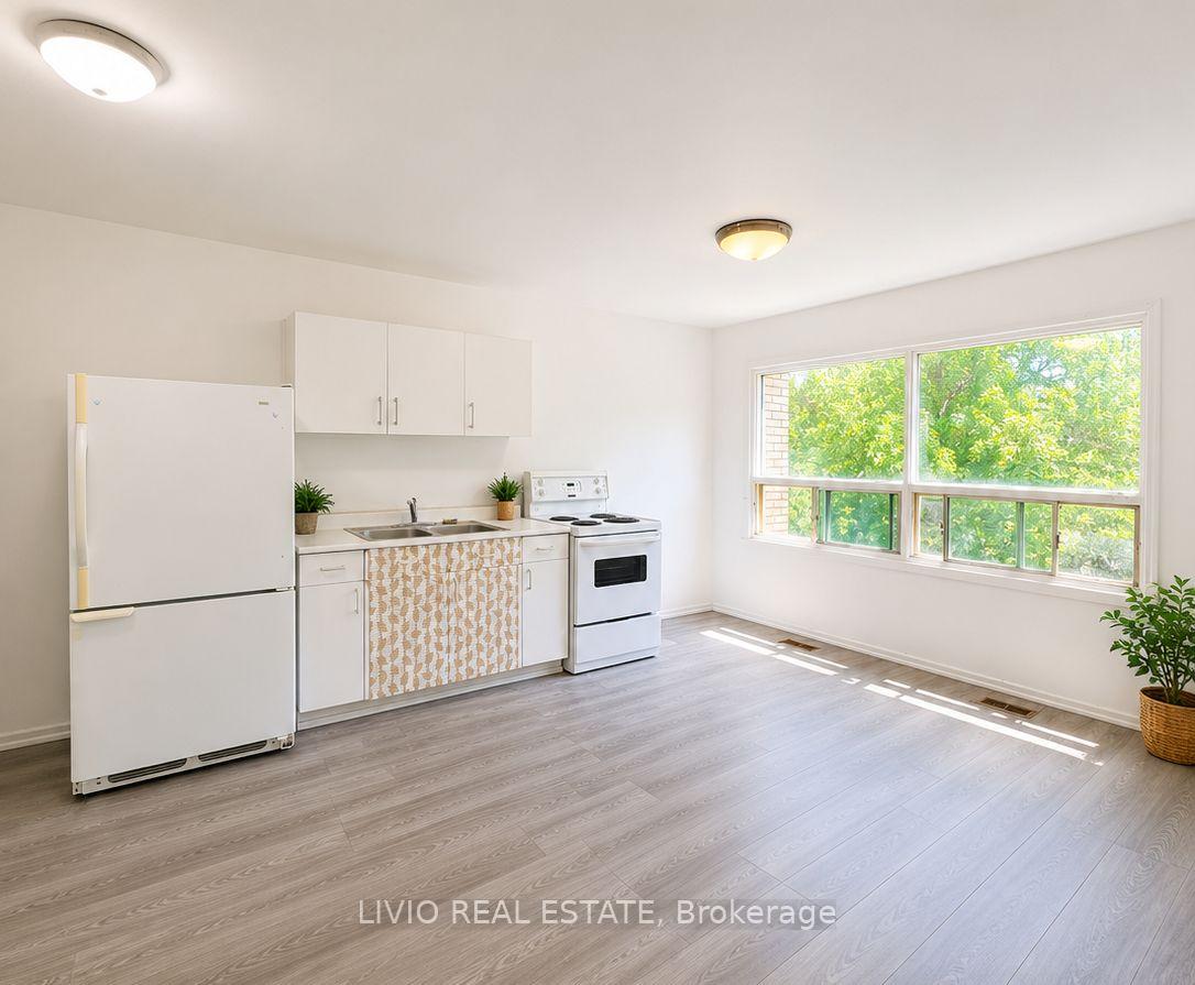 Photo 2 of 2967 St. Clair Avenue E, Toronto, O'Connor-Parkview — HOMEH