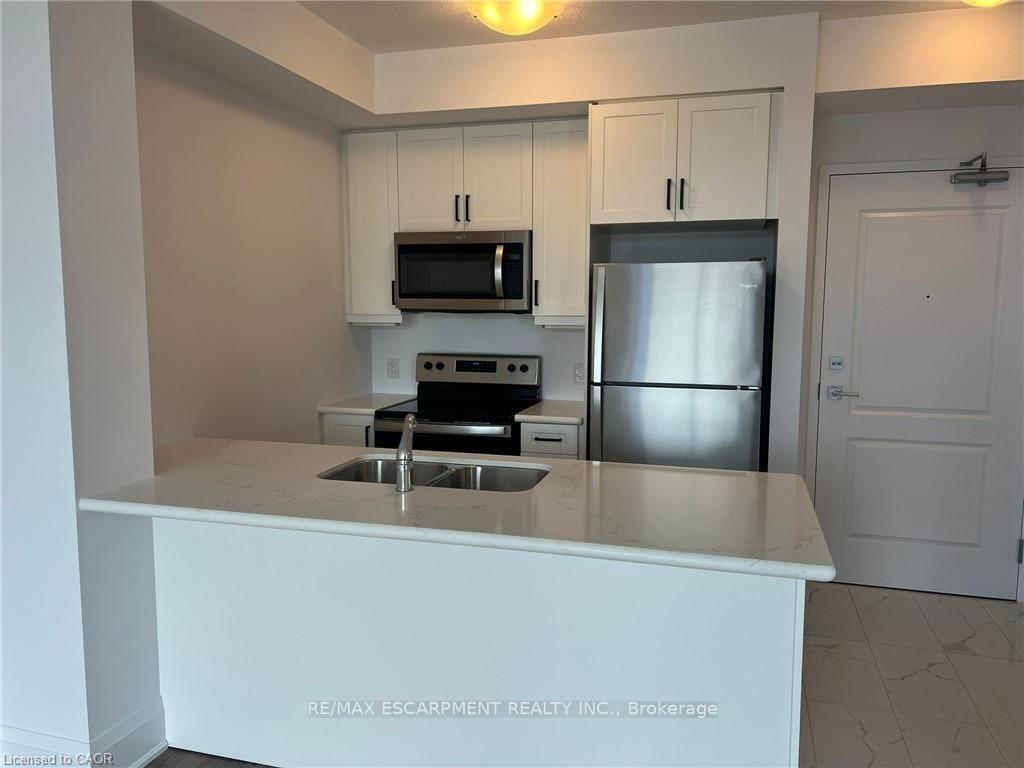 Photo 10 of Unit 409, 450 Dundas Street E, Hamilton, Waterdown — HOMEH