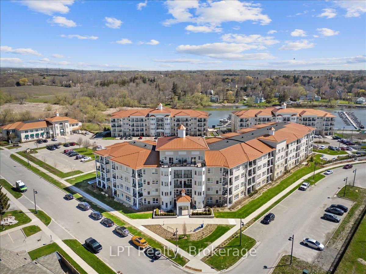 Photo 3 of Unit 102, 50 Lakebreeze Drive, Clarington, Newcastle — HOMEH