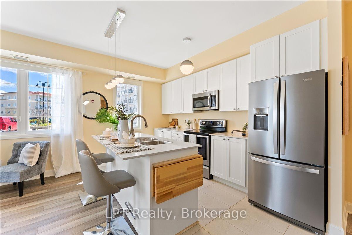 Photo 9 of Unit 102, 50 Lakebreeze Drive, Clarington, Newcastle — HOMEH