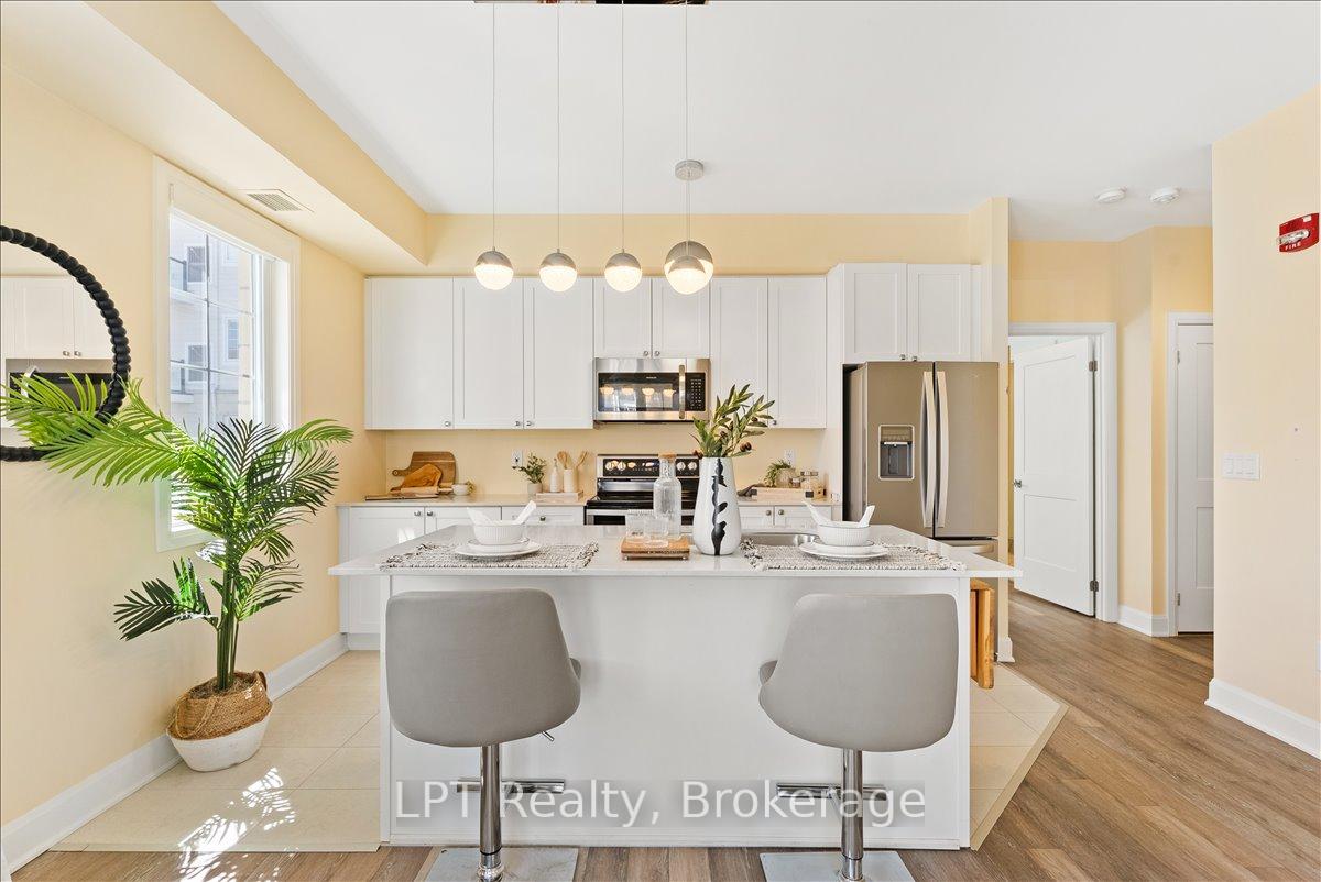 Photo 10 of Unit 102, 50 Lakebreeze Drive, Clarington, Newcastle — HOMEH