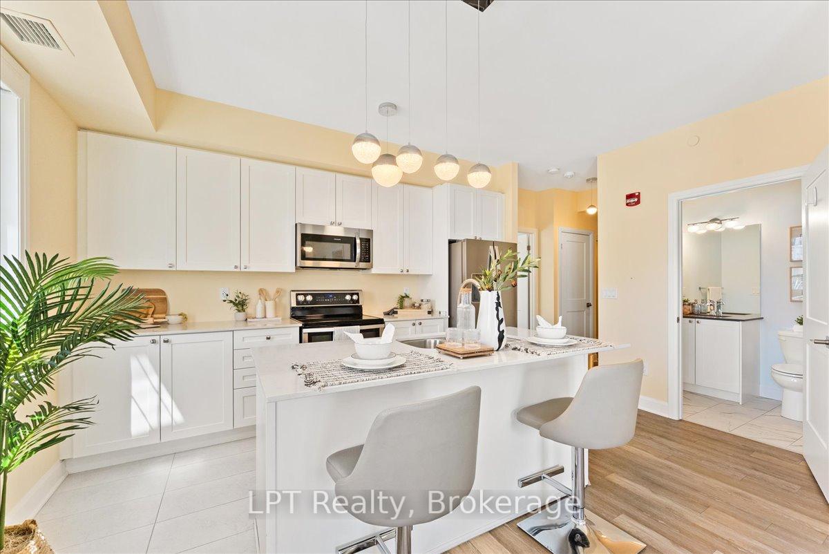 Photo 11 of Unit 102, 50 Lakebreeze Drive, Clarington, Newcastle — HOMEH