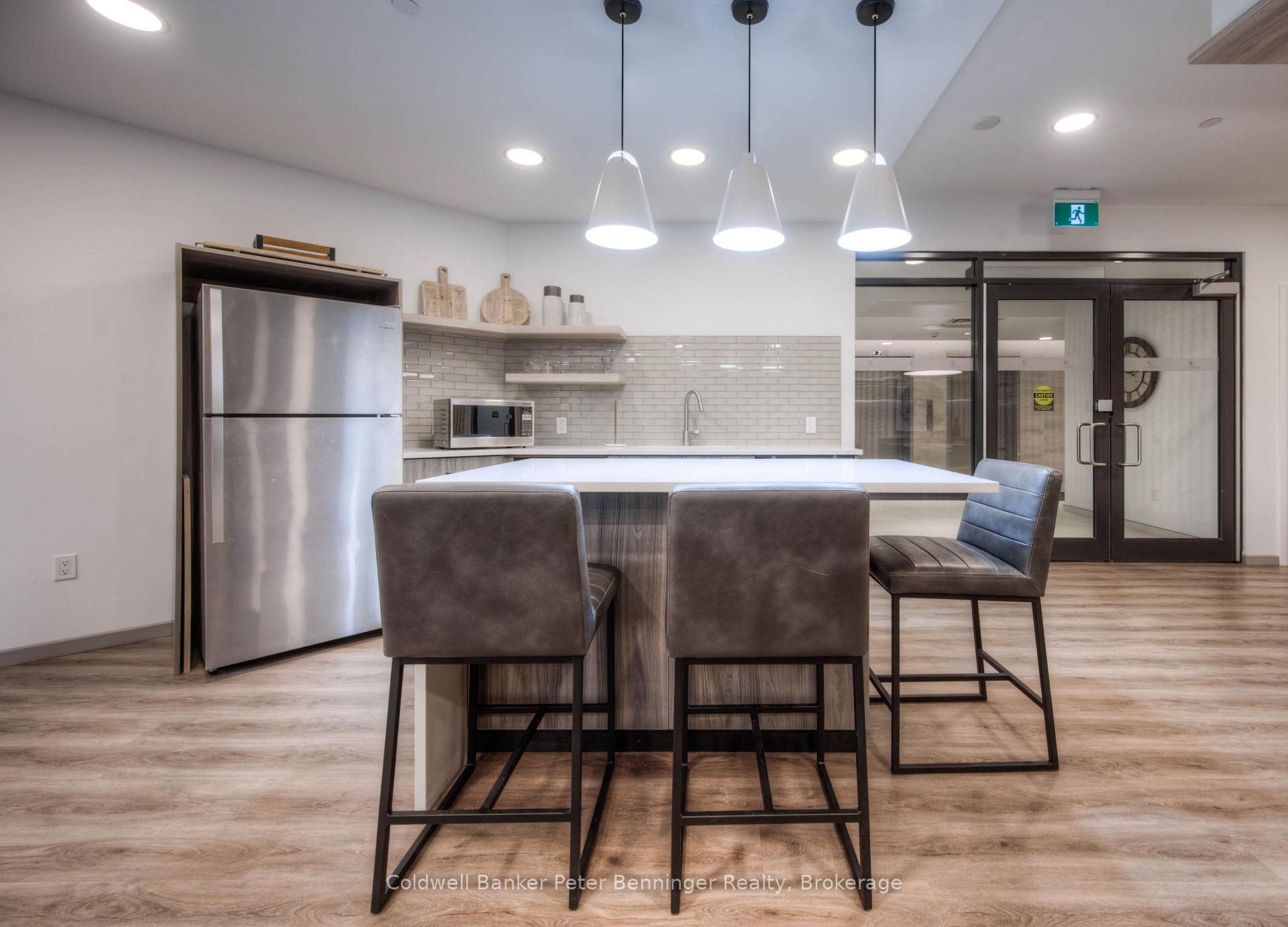 Photo 41 of Unit 104, 332 Gosling Gardens, Guelph, Clairfields/Hanlon Business Park — HOMEH