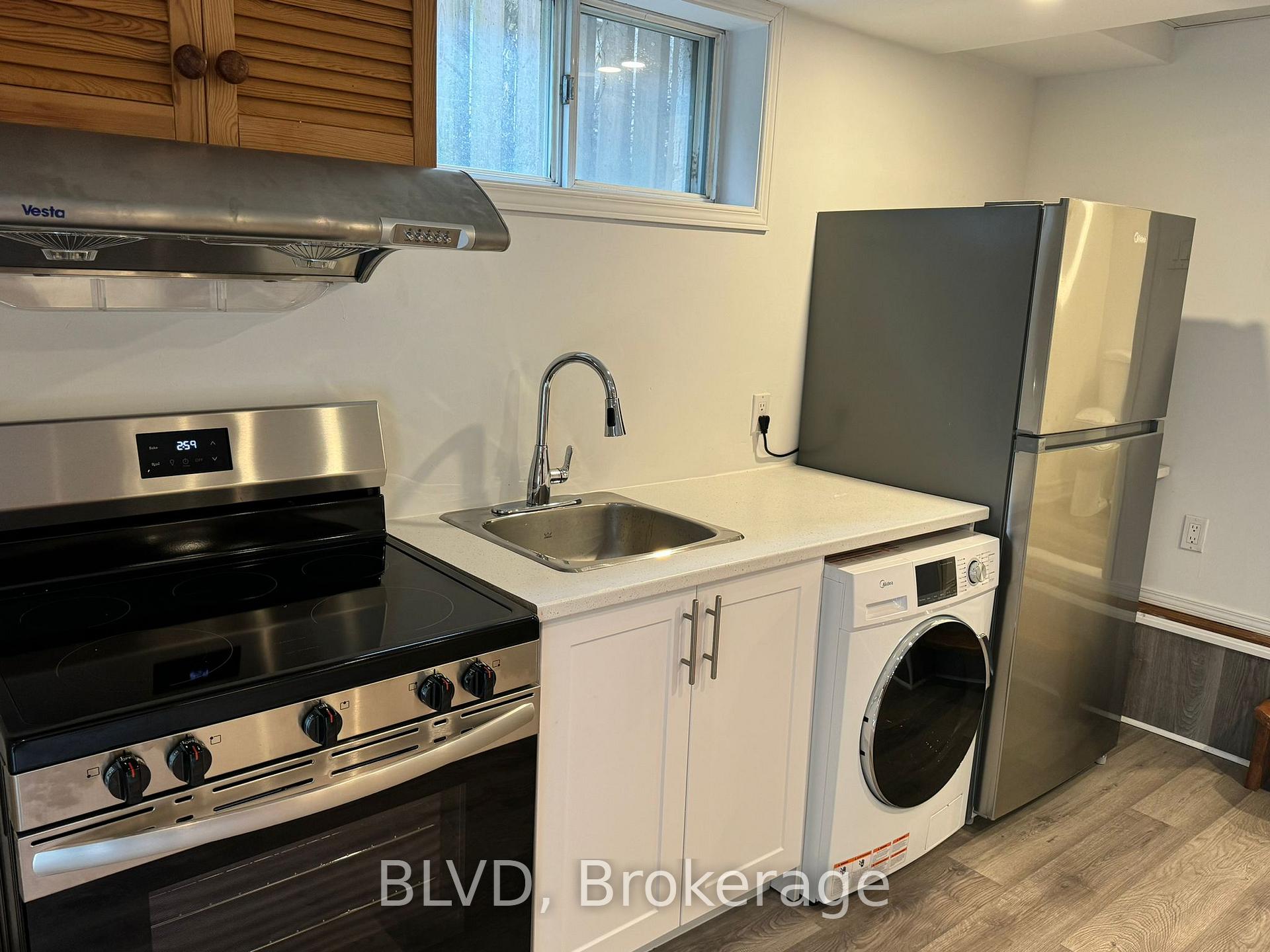 Photo 4 of Unit Lower Level, 63 Johnston Avenue, North York, Lansing-Westgate — HOMEH