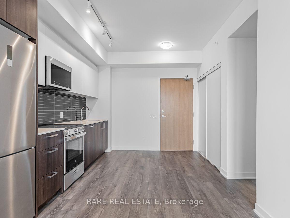 Photo 5 of Unit 815, 1787 St Clair Avenue W, Toronto, Weston-Pellam Park — HOMEH