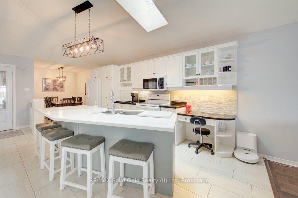 Photo 12 of 330 Lake Louise Boulevard, Waterloo, Conservation Meadows — HOMEH