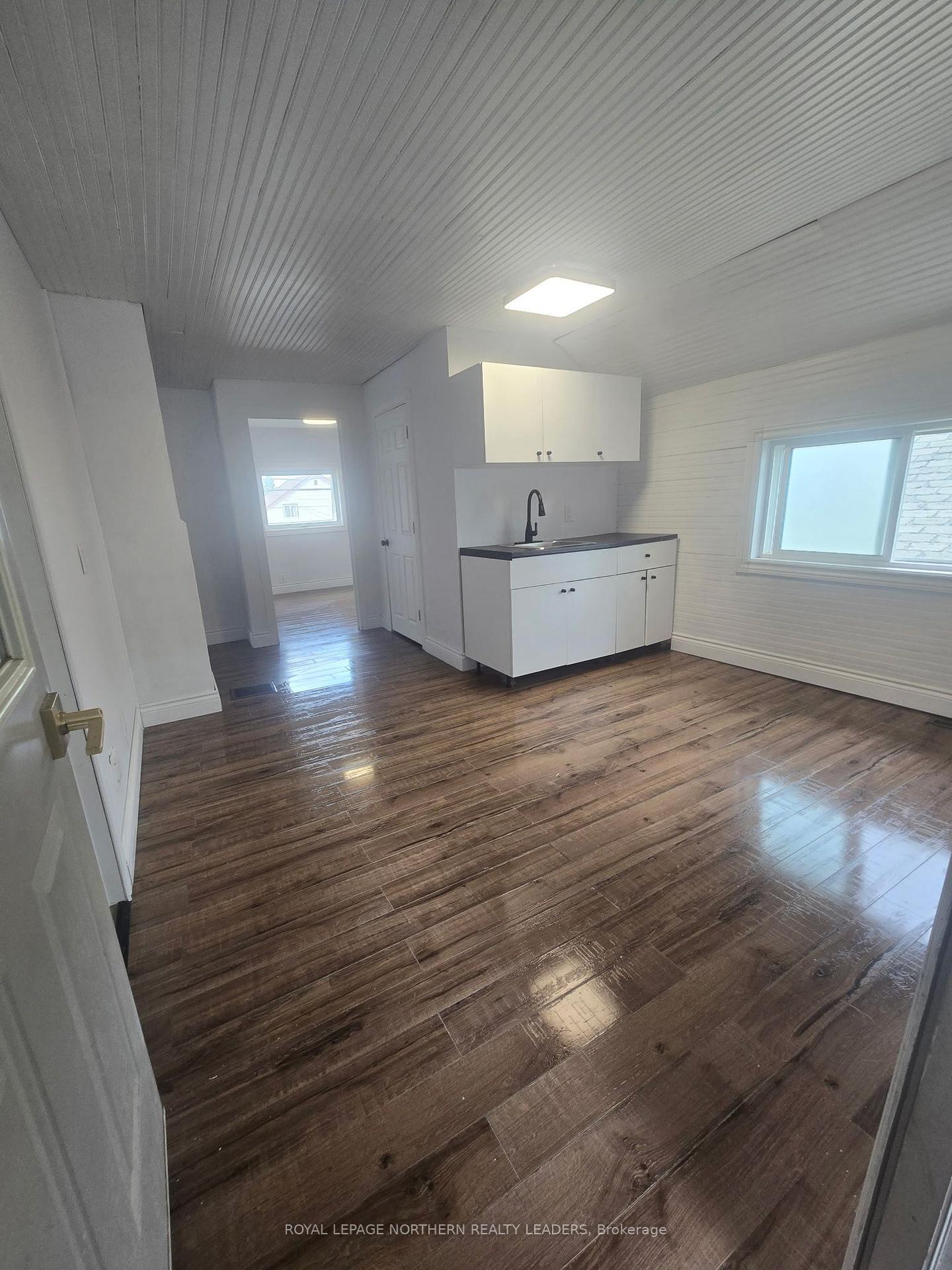 Photo 2 of 104 Fourth Avenue, Timmins, SCH - Main Area — HOMEH