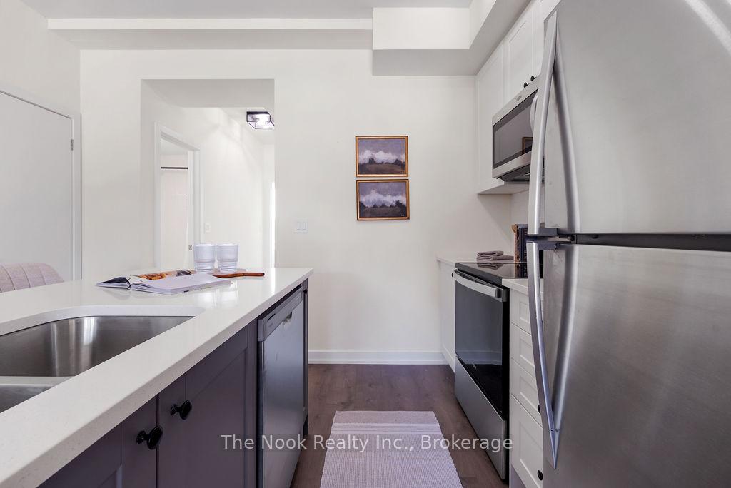 Photo 10 of Unit 702, 160 Densmore Road, Cobourg — HOMEH