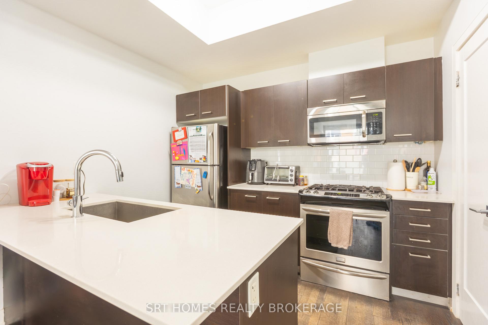 Photo 4 of Unit 3, 1321 Gerrard Street E, Toronto, Greenwood-Coxwell — HOMEH