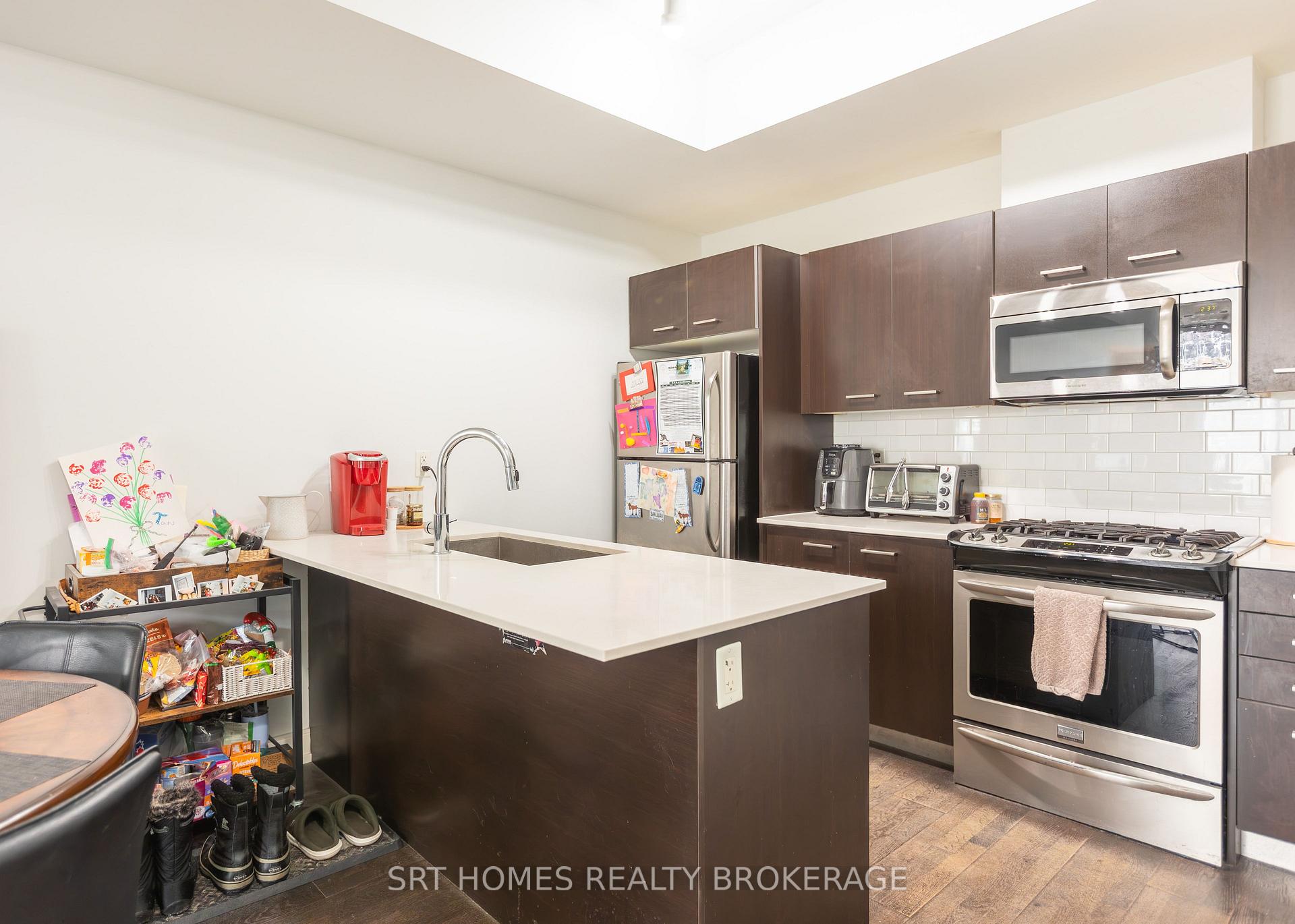 Photo 5 of Unit 3, 1321 Gerrard Street E, Toronto, Greenwood-Coxwell — HOMEH