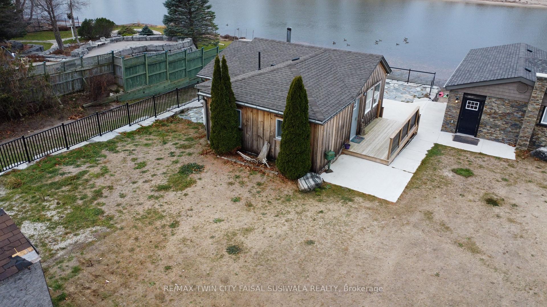 Photo 3 of 2 Browns Lane, Wasaga Beach — HOMEH